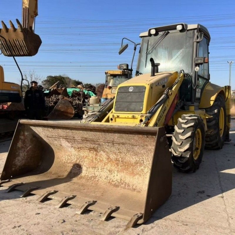 Warna Asli New Holland Loader Backhoe LB85 Traktor Industri