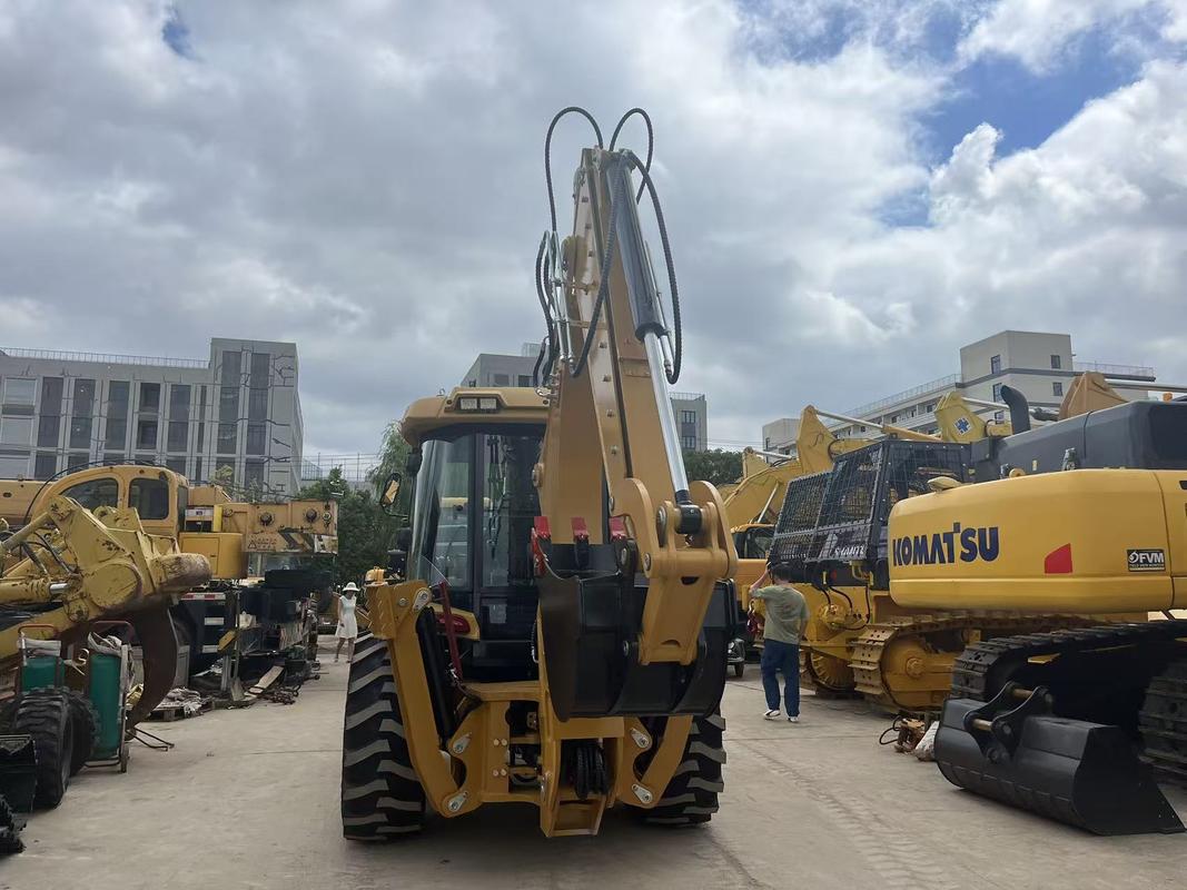 Ekskavator backhoe loader Caterpillar 420F baru dengan ember yang dapat dibuka dan boom yang dapat diperpanjang